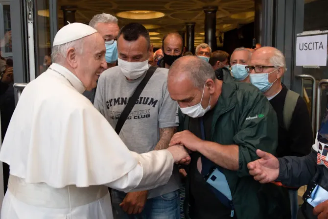 Pope Francis greets people at the Paul VI Audience Hall after a screening of the documentary “Francesco”, May 24, 2021